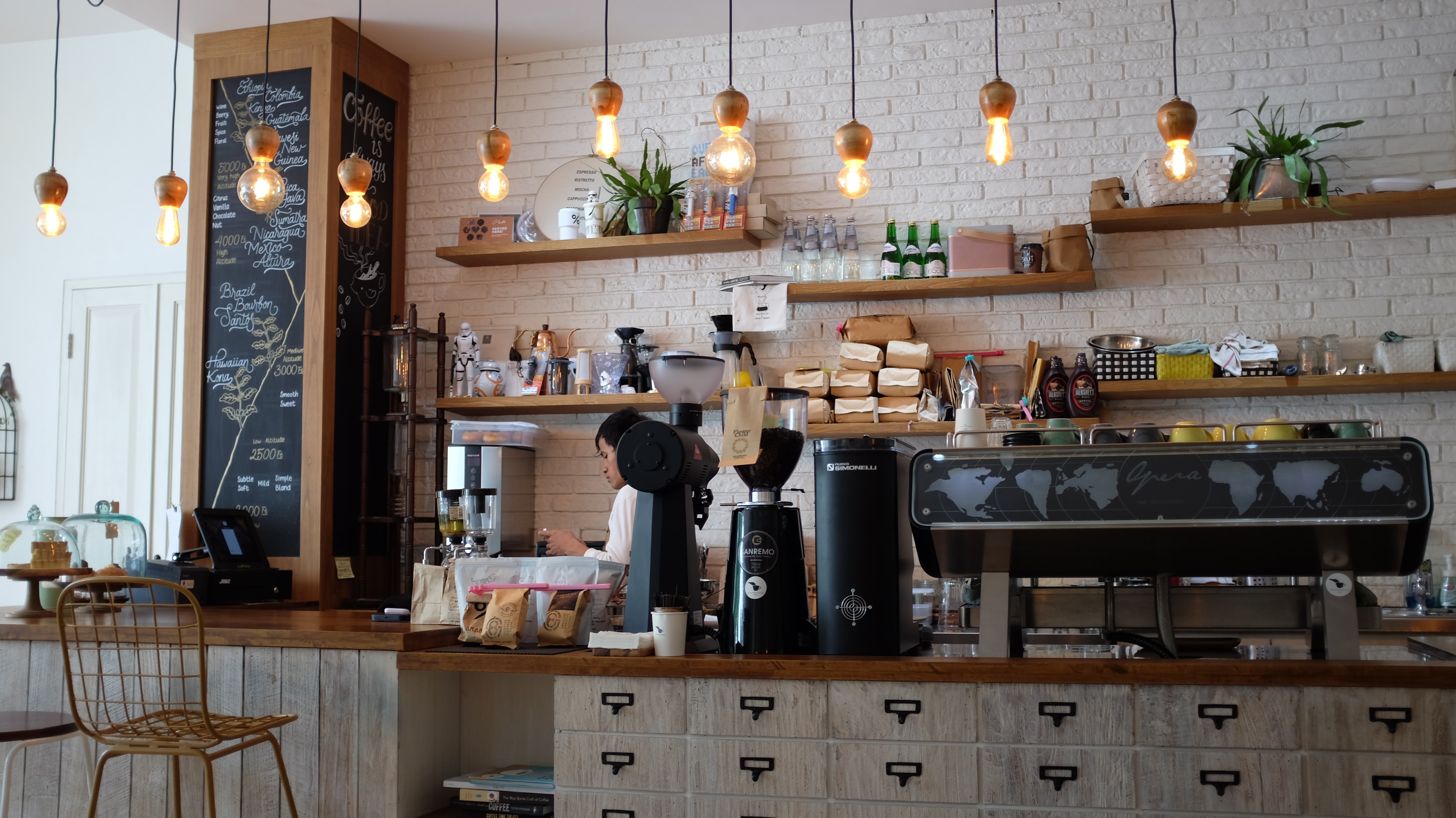 Cafe with Coffee Machines and Barista