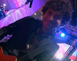 Unlike many of us fans think, he actually DOES smile!
