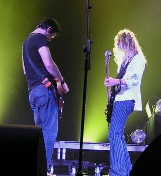 Isn't that cute? Phil's helping him! :D
