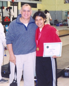 photo of coach Randall w/Ariana Nov. 2003-gold medal