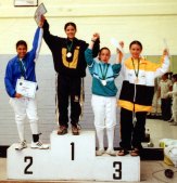 photo of Ariana on podium w/ her second medal, silver in Oct. 2002