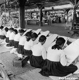 Women Checking Silk For Flaws