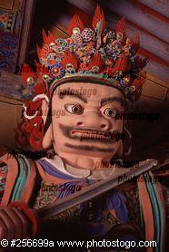 Gate Guardian Statue At Buddhist Temple