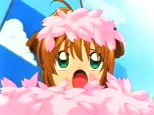 Sakura bajo p�talos de cerezo