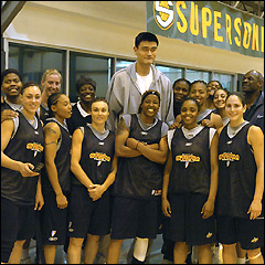 Seattle Storm pose with Houston Rockets center Yao Ming