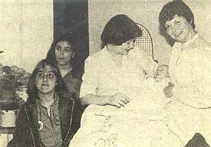 Mom and I receiving the Girl Scout's quilt.