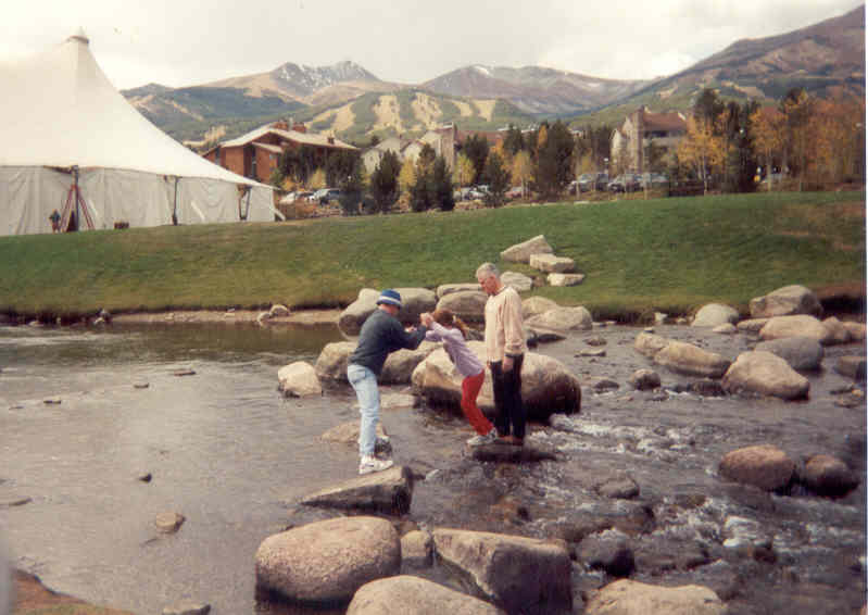 Ethan, Nikki and Dad playing in the creek in Breckenridge, CO