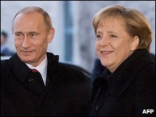 Vladimir Putin and Angela Merkel