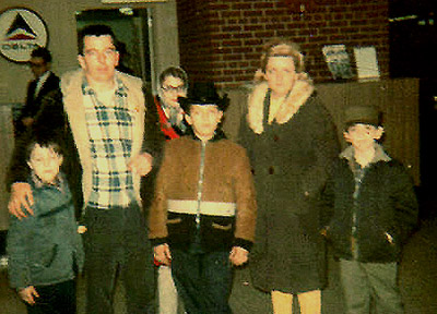 Little Boy Joey (center) with brothers and parents