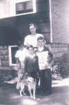 barbara_john_frank_john_jr_with_dog.jpg (65590 bytes)