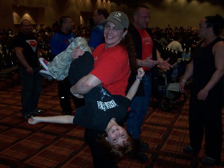 Andrea really knows how to pick a kid up