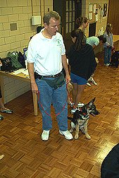 Sirius and Brian watch the
other pups strut their stuff