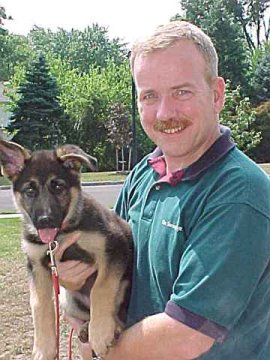 Detective Brian Foskey & Puppy Sirius