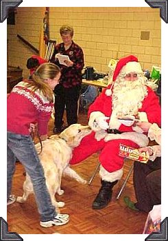 An Anxious pup greets Santa