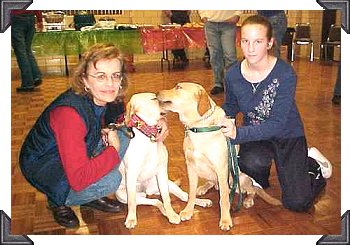 Diane and Kim with a couple of lab pups