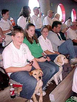 Pups and Puppy Raisers waiting for the Dolphin Show to begin