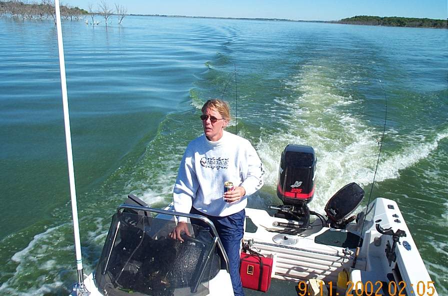Chris driving the boat at Devils Lake