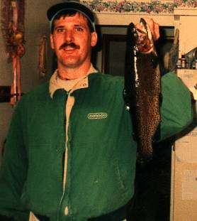 Mike after a hard day fishing with a big fish in his left hand, honest!