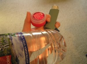 the bare essentials - water, lip gloss, ventolin