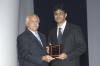 Faisal Manzoor Arain receiving the 2005 PMI Donald S. Barrie Award from PMI Chair, Louise Mercken MBA, PMP