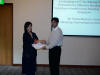 Faisal receiving certificate of appreciation from Ms. MAO (President JTC Consultants), at The JTC Summit, Singapore