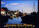 Trawlers & barges moored along the banks of Malacca River