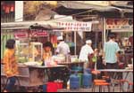 Tasting the local foods @ the numerous food stalls (Stock: Nil) 