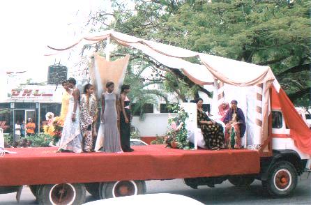 Models wearing MUSTAFA HASSANALI are paraded on a float at the Mombasa Cultural Carnival 2000