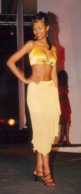 An elegant Mustafa Hassanali creation, Beachwear Modeled by one of the semi Finalists   