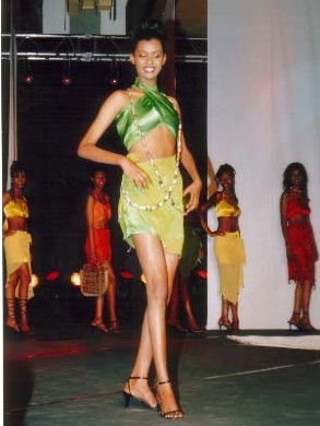 An elegant Mustafa Hassanali creation, Beachwear Modeled by one of the semi Finalists   