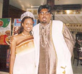 An elegant Mustafa Hassanali creation, The Queen With The Designer    