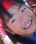 A happy kid at Nishi elementary's undokai (sports day)