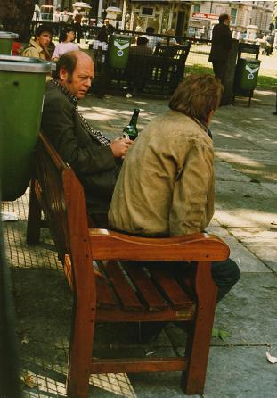 People drinking in London bench