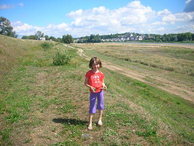 Isabelle by the Loire River with Amboise behind