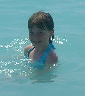 Isabelle playing in the waves of Nice