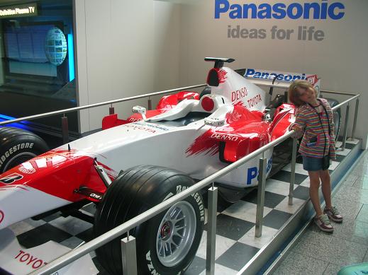 Isabelle in front of Ralf Shumarer's F1 car