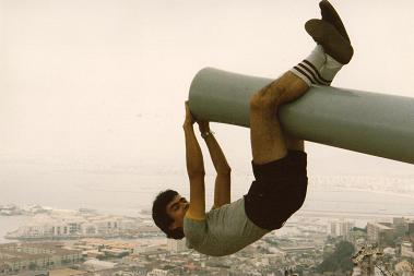 Dave hanging upside down on the canon