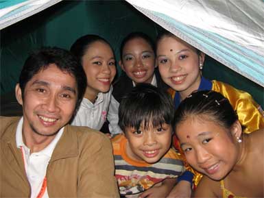 FCFISC Coach Bong and figure skating girls in the FCFISC tent
