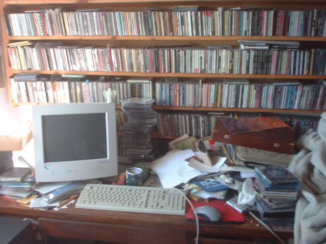 CD rack above the desk