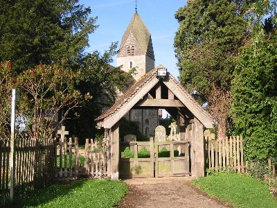Lych gate in early sunlight