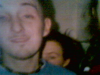 who's that girl behind that guy...and who's that guy, by the way?