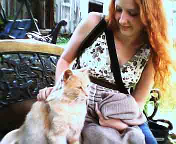 Laurie and Fluffy, my dad's new cat.