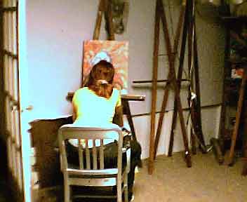 Kathleen painting her self-portrait....