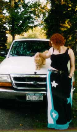 three bif favorites here: My favorite pants in the world, i made from fake fur and some salvation army jeans. yes, they're fuzzy. My tuck, which i love, and the cat who adopted my dad. i love the cat, but he's definitely dad's cat.