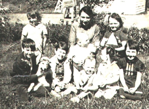 an old picture of my mom and my aunts and uncles