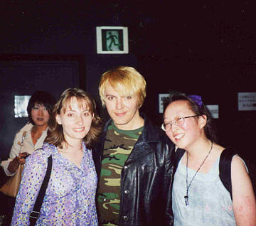 Tina, Nick, and me smile for the cameras