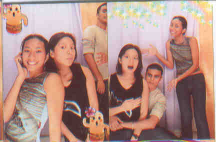 i was using the phone that time. haha. jus me n ma lover lee. haha. nolar. trying to present the two lovebirds.look lee is covering her left boob. haha.