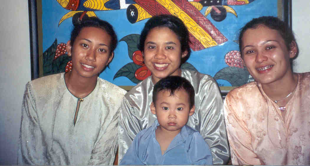 picture of me,my cousin widdy n the mother of mika who is also in the pic n my dear sista tush.