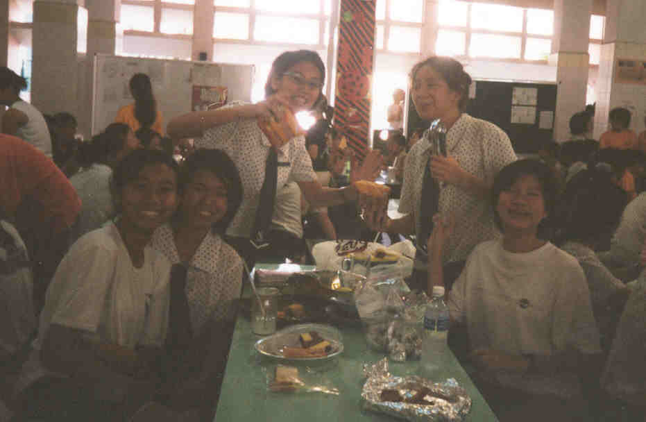 us in da canteen durin some occasion in sch. happy times.