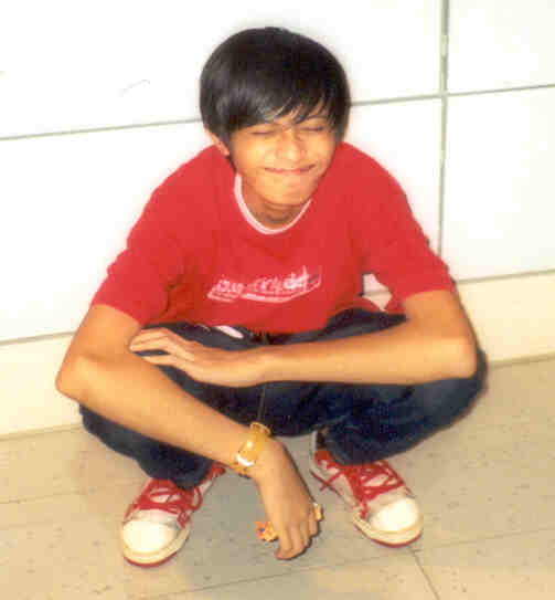 hahah!! this is soo cute! this is adi. haha. smile until like that. we were outside hmv at city link.